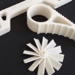 Pezzi meccanici in materiale speciale simil Nylon